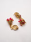 Gold-Plated Artificial Stones Studded And Beaded Contemporary Shaped Jhumkas