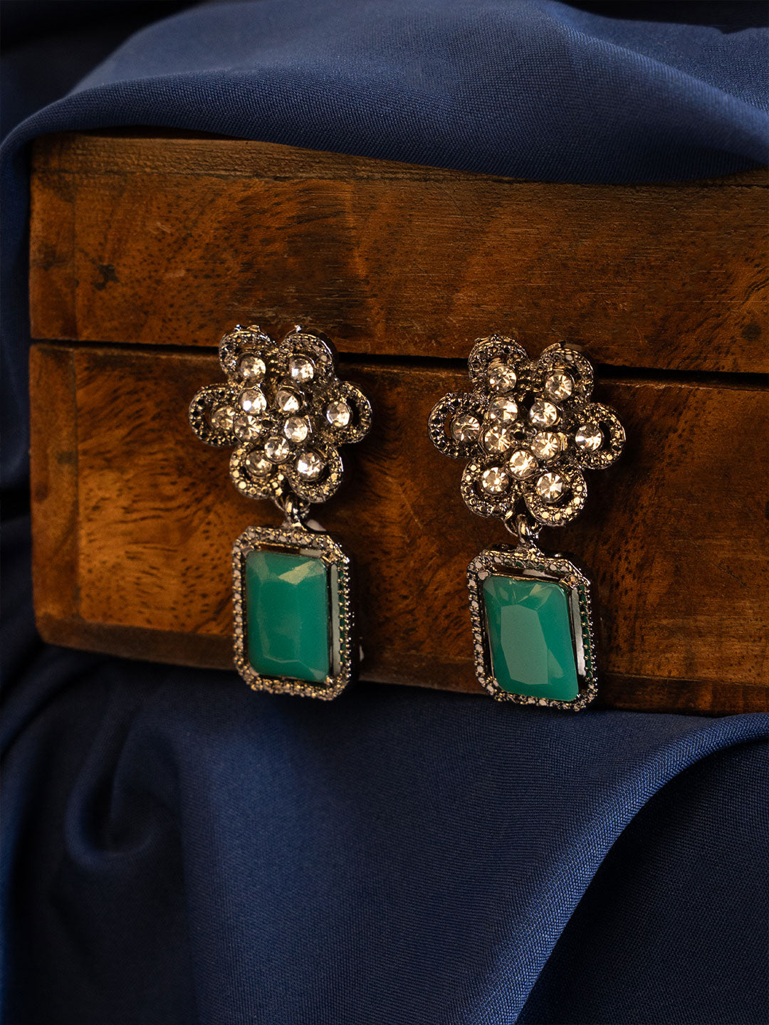Silver-Plated American Diamond Studded Floral Shaped Drop Earrings