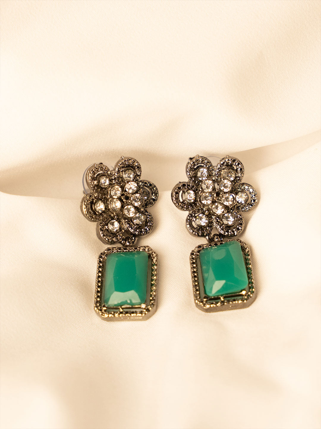 Silver-Plated American Diamond Studded Floral Shaped Drop Earrings