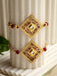 Set of 2 Gold-Plated Handcrafted Kundan Lumba & Rakhi