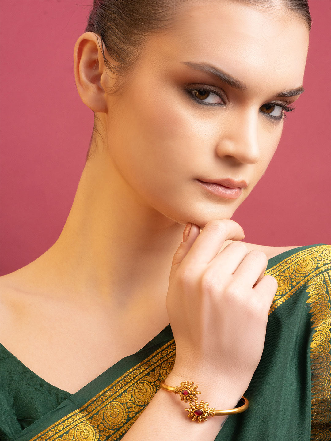 Women Brass Gold-Plated Bangle-Style Bracelet
