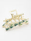 Women Gold-Plated Stone Studded Embellished Claw Clip