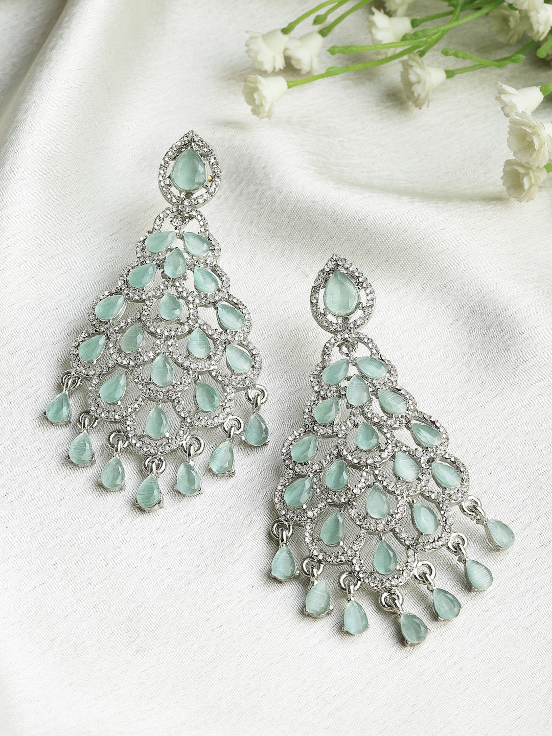 Silver-Plated Kundan Studded Teardrop Shaped Drop Earrings