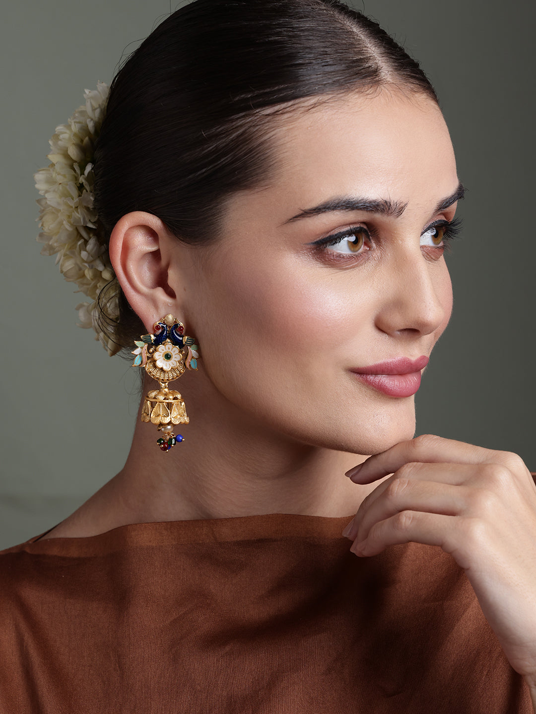 Gold Plated Cubic Zirconia Studded Peacock Shaped Jhumkas Earrings