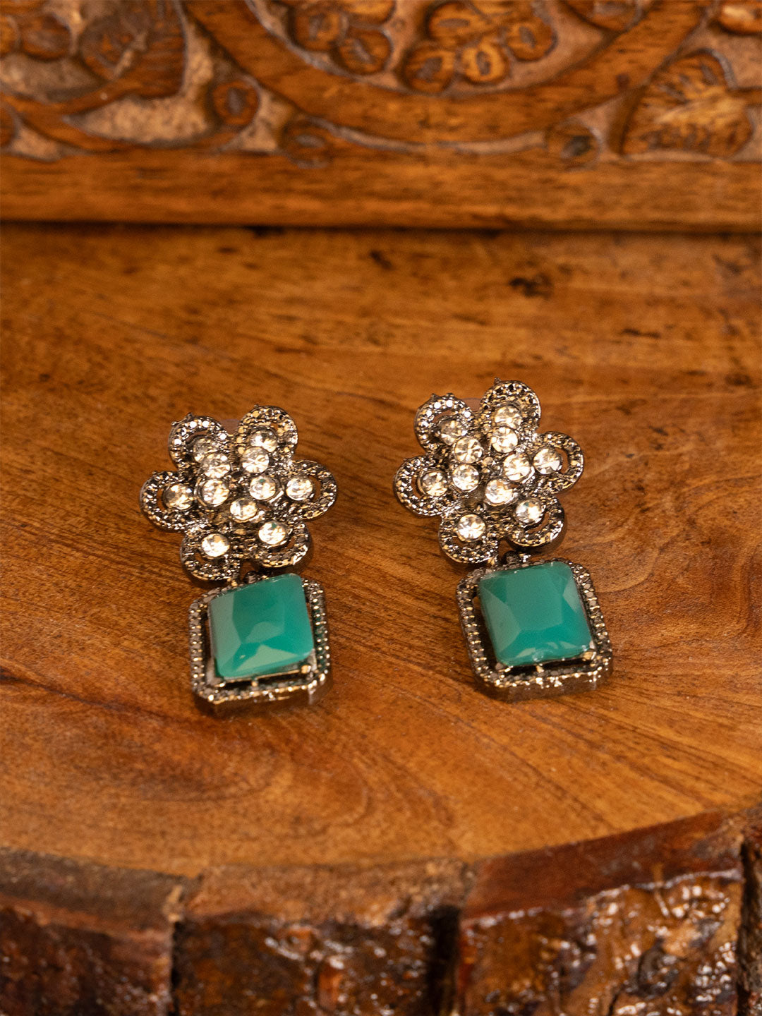 Silver-Plated American Diamond Studded Floral Shaped Drop Earrings