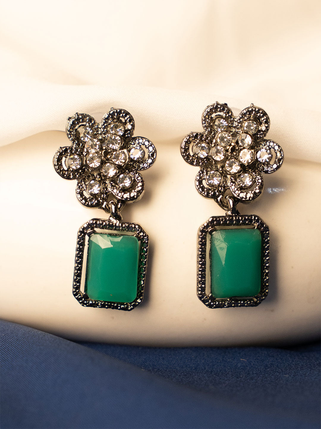 Silver-Plated American Diamond Studded Floral Shaped Drop Earrings