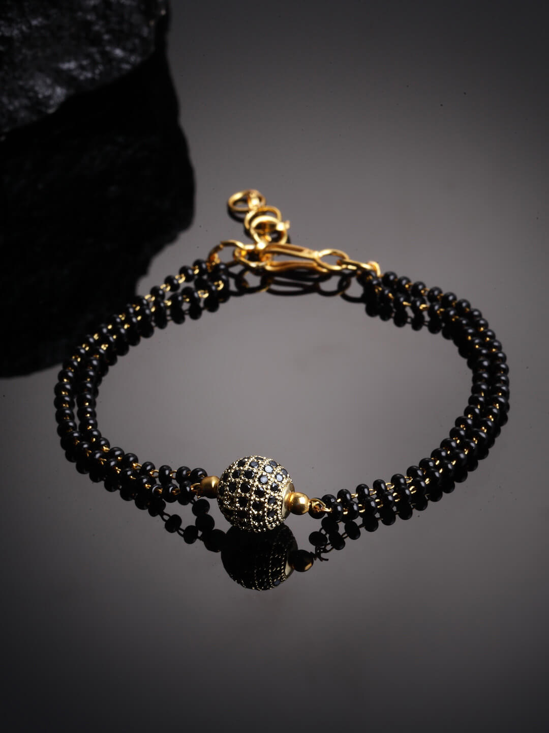 Gold-Plated Black Stone-Studded & Beaded Hand Mangalsutra