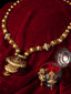 Gold-Plated & Green Stone-Studded & Beaded Jewellery Set