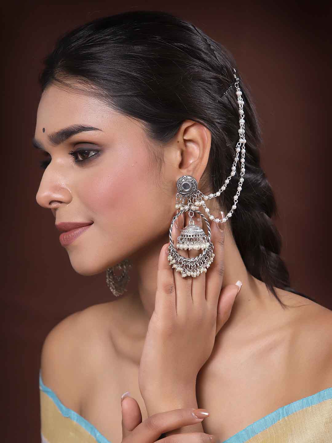 Women Silver-Toned Circular Jhumkas Earrings