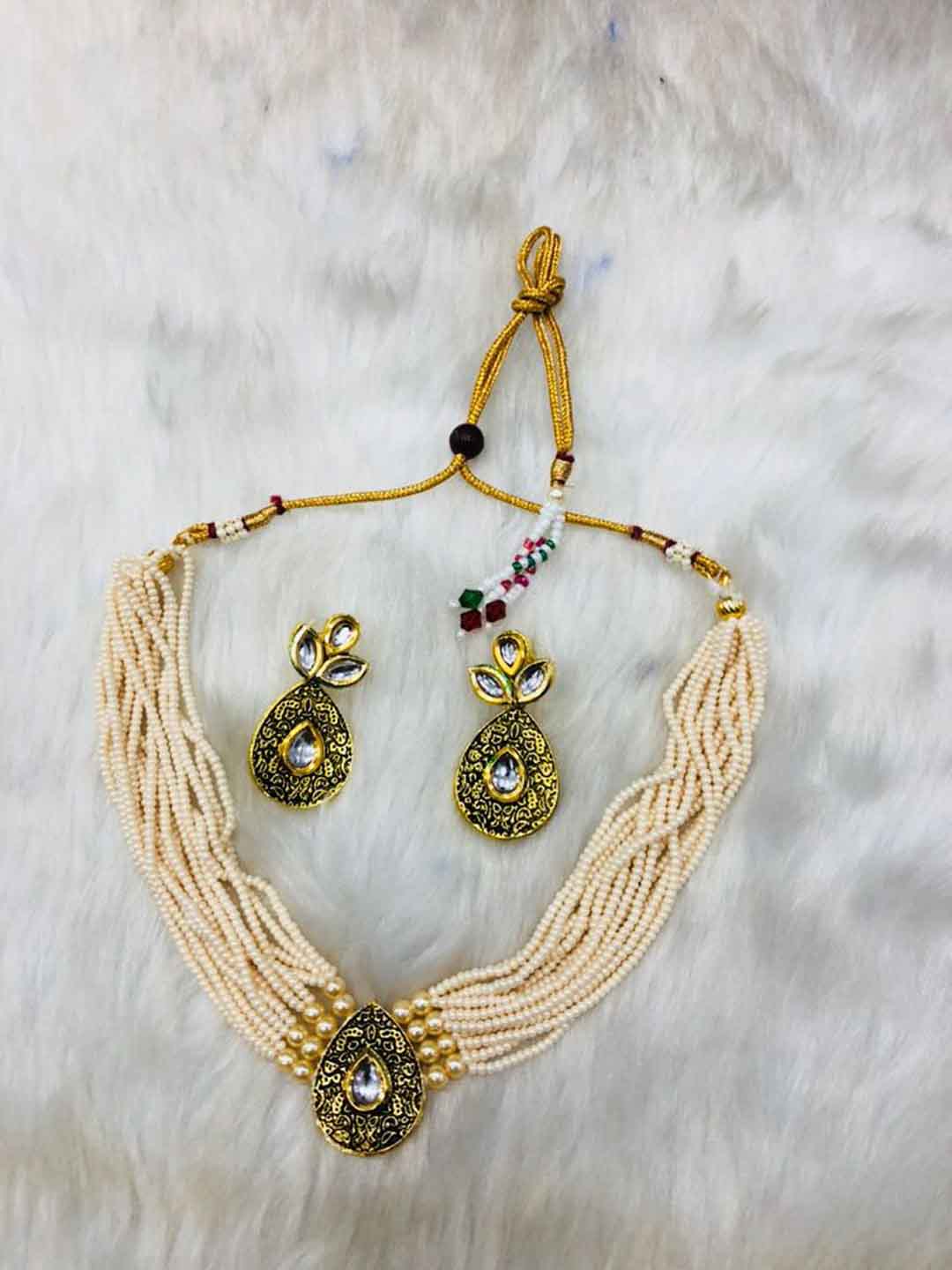 Gold-Toned & Off-White Kundan-Studded & Beaded Jewellery Set