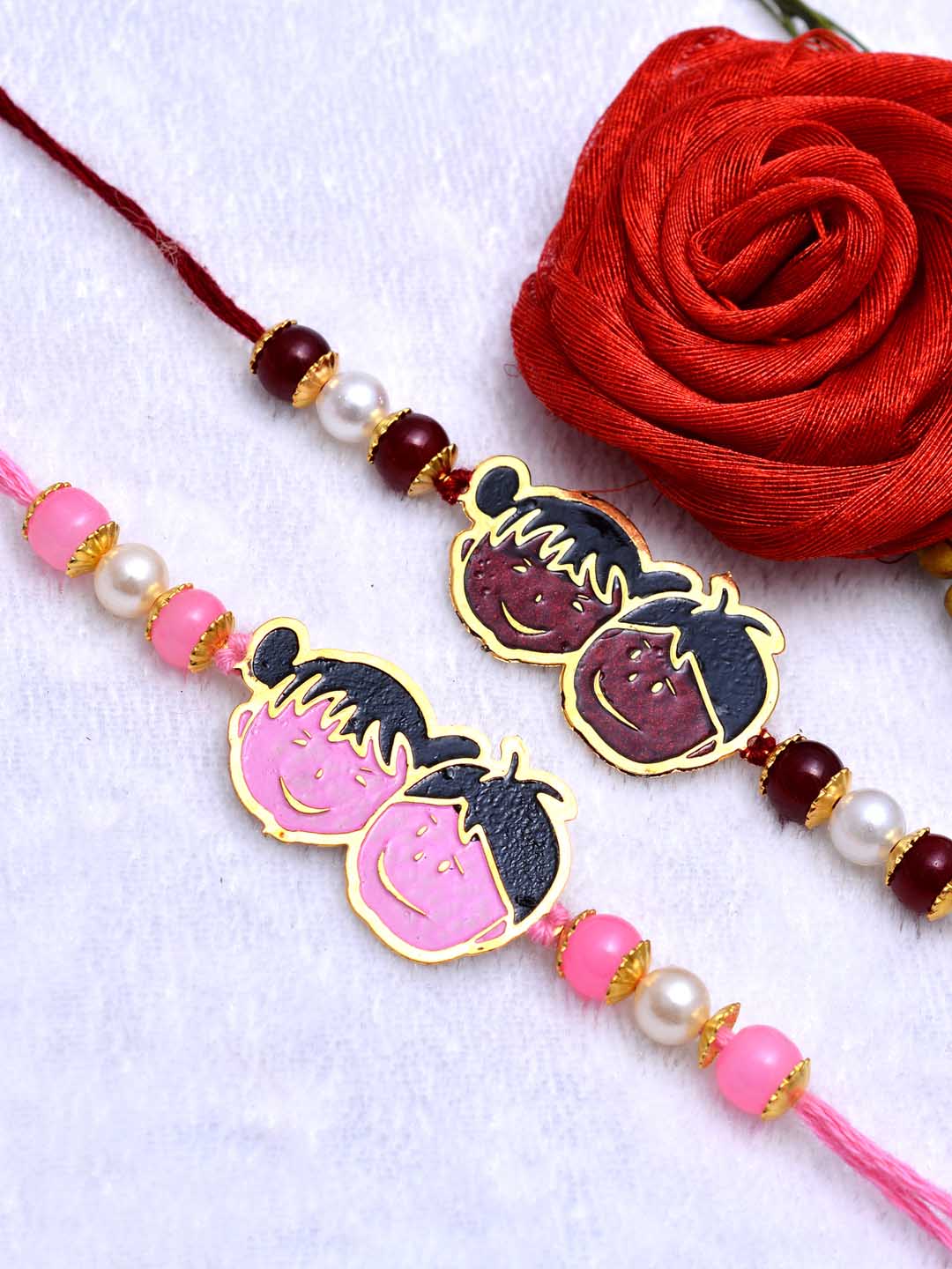 Set of 2 Boys Gold-Toned Pink & Red Handcrafted Rakhi With Roli Chawal